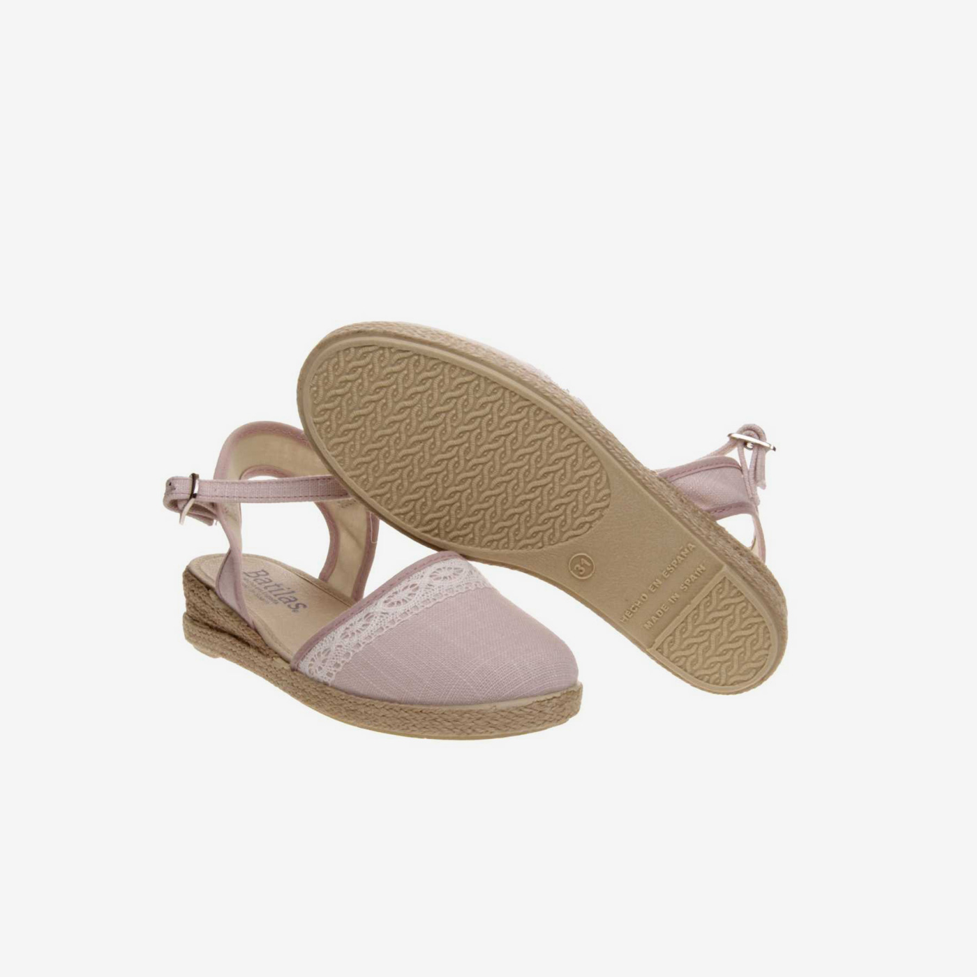 Sandalia de esparto en color rosa con hebilla.