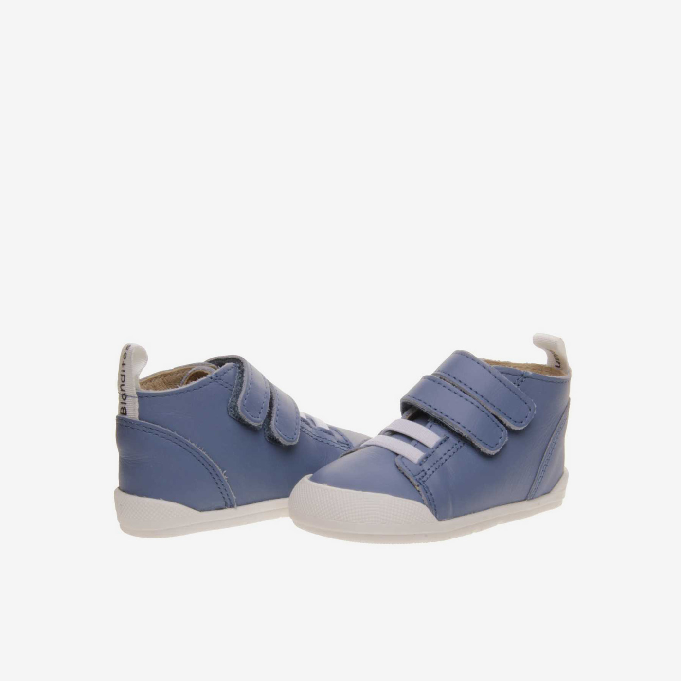 Bota de niño respetuosa con velcro y elásticos.