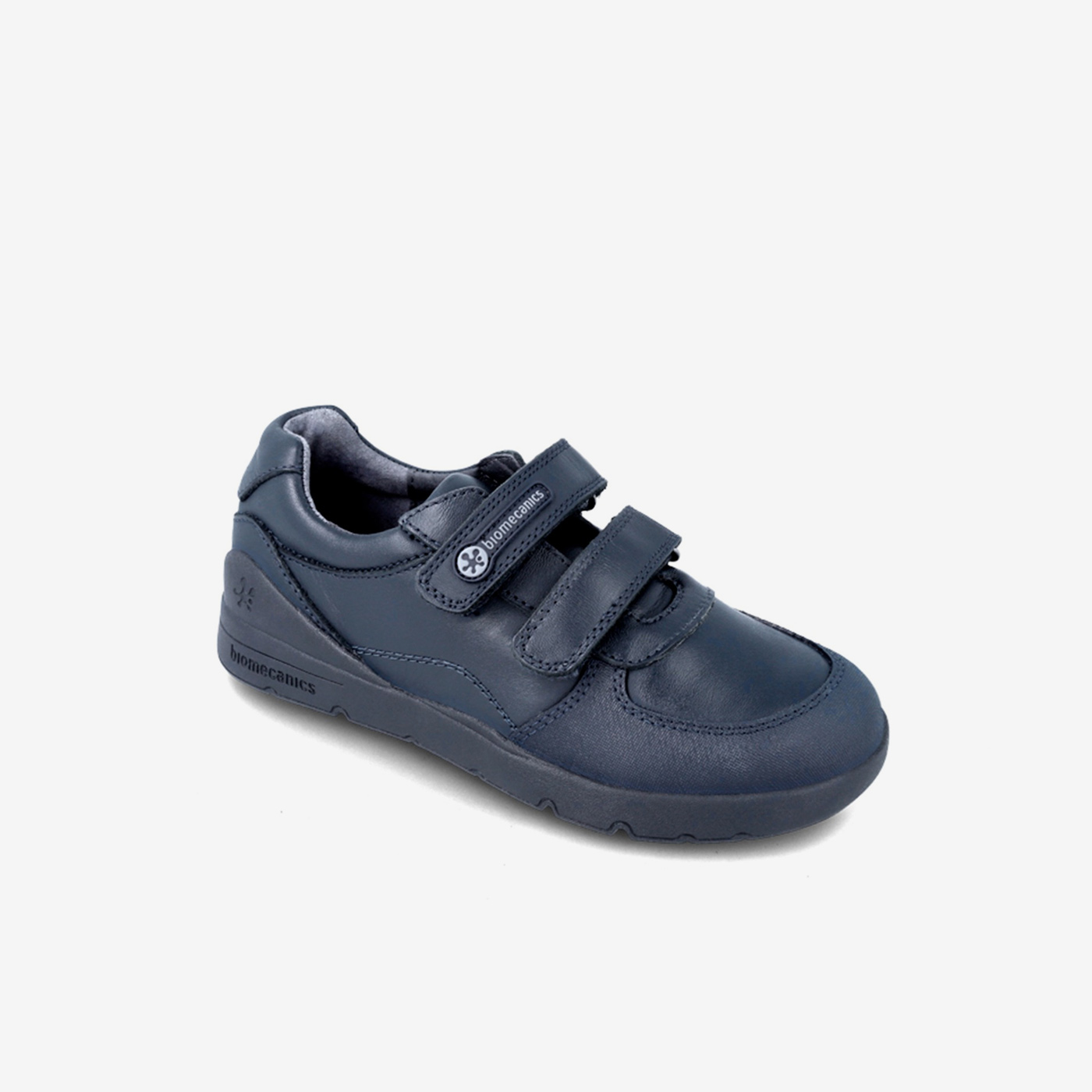 Zapato colegial de niño con doble velcro en azul marino.