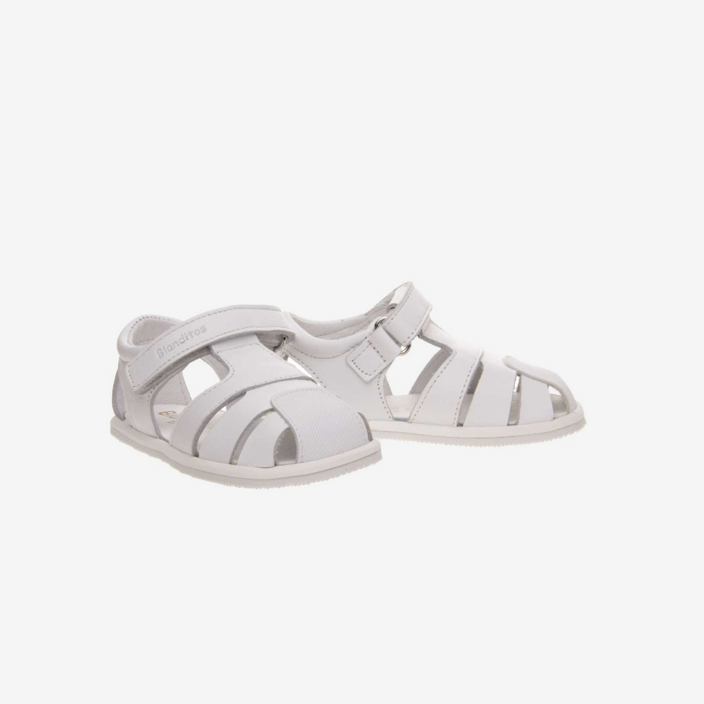 Sandalia respetuosa en color blanco con velcro.