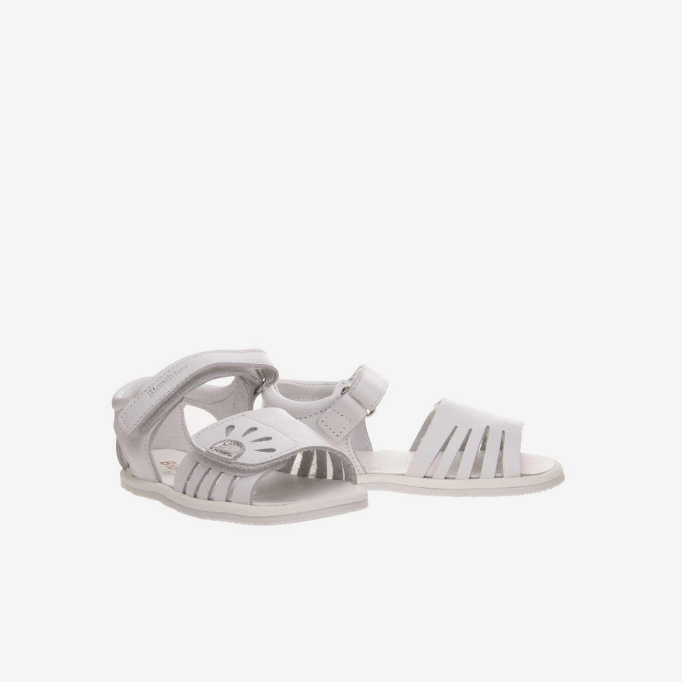 Sandalia de niña respetuosa con velcros.