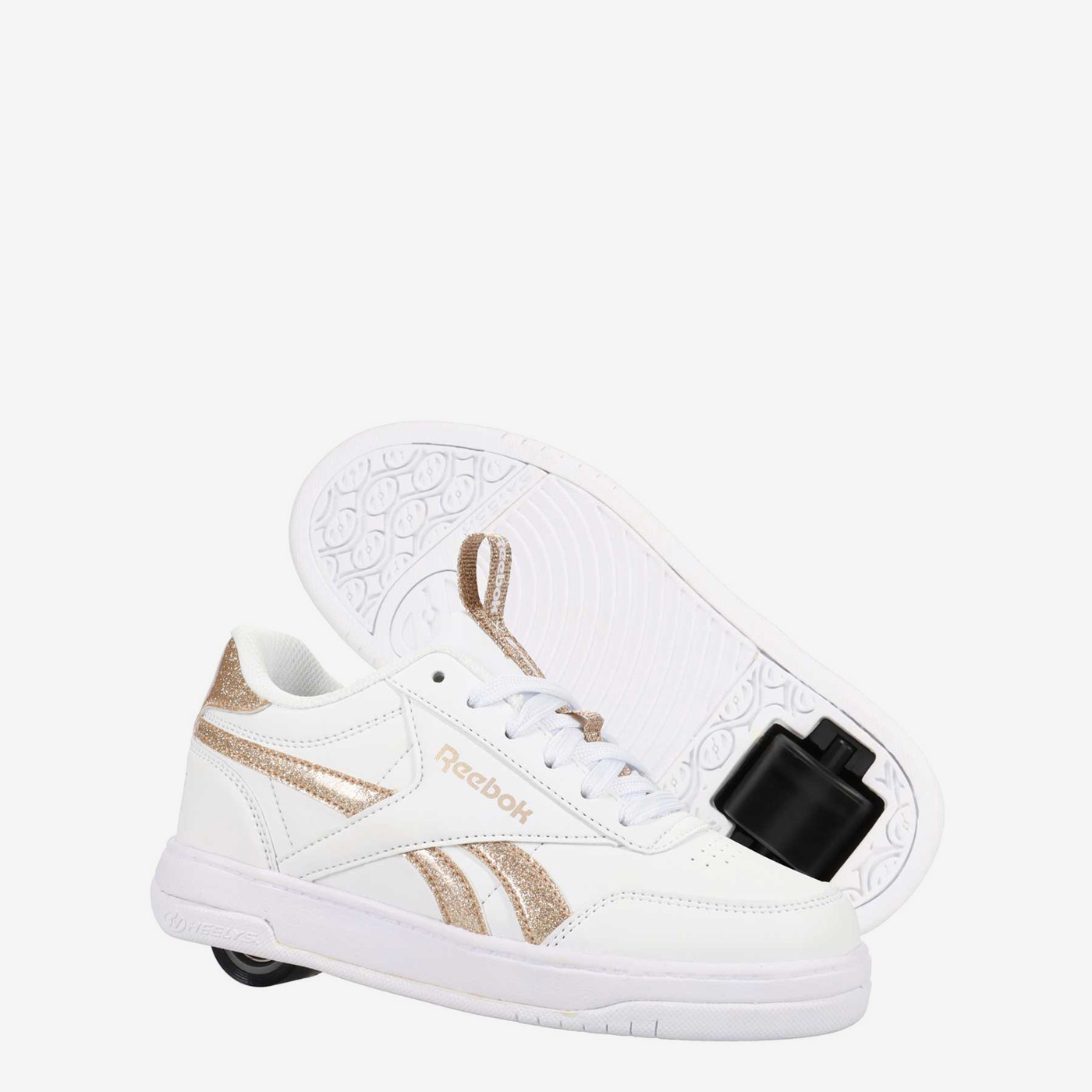 Deportivo blanco de niña con ruedas y cordones.