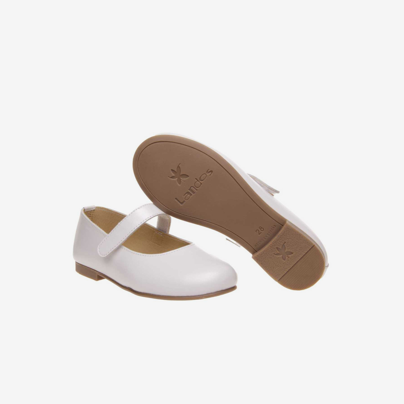 Merceditas fino de niña con velcro en color blanco.