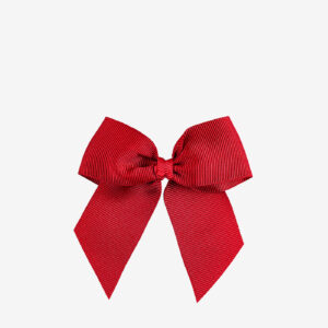 Lazo rojo de grosgrain de la marca Condor para niña con pinza. Sujeta sin tirar, añade un toque vivo y combina genial con uniforme o looks festivos.