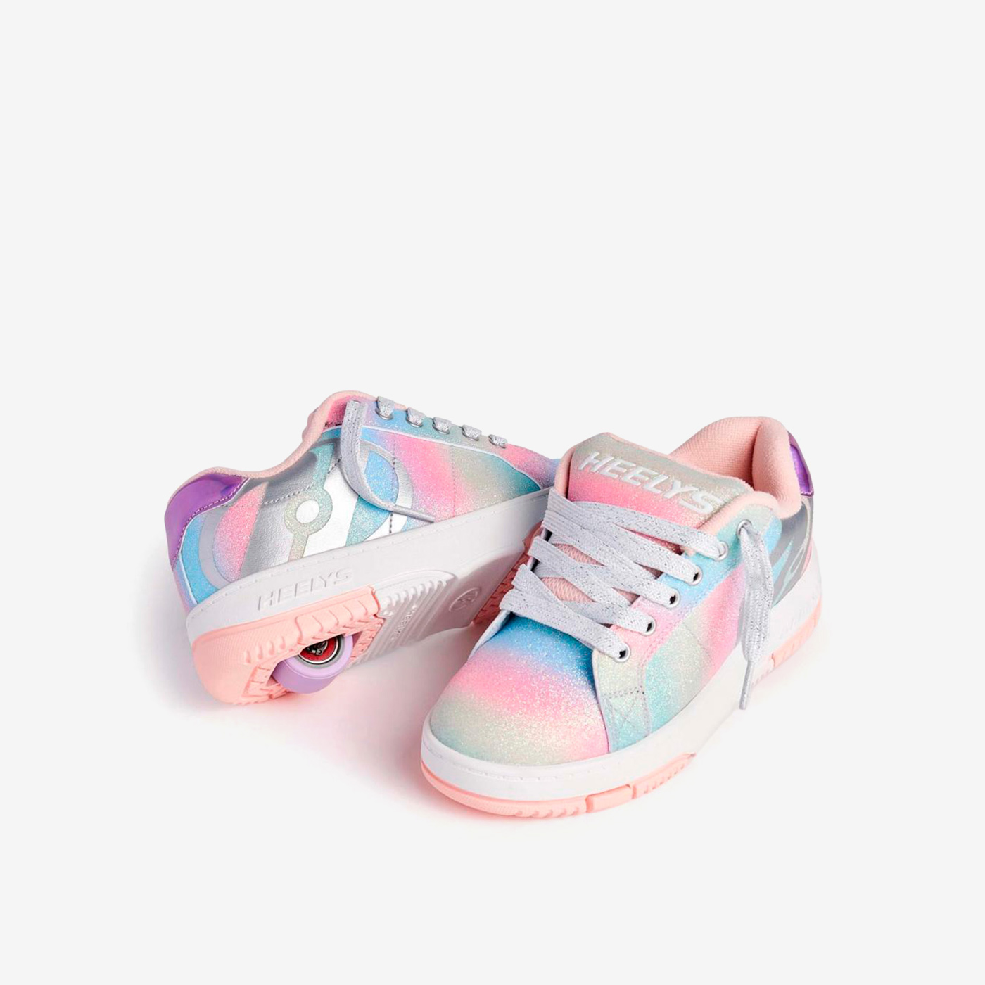 Heelys arcoíris para niña, con ruedas desmontables y diseño brillante. Comodidad, estilo y diversión que acompañan cada movimiento.