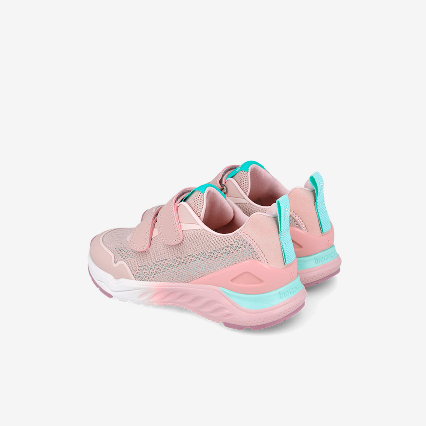 Deportiva rosa con puntera de goma y doble velcro.