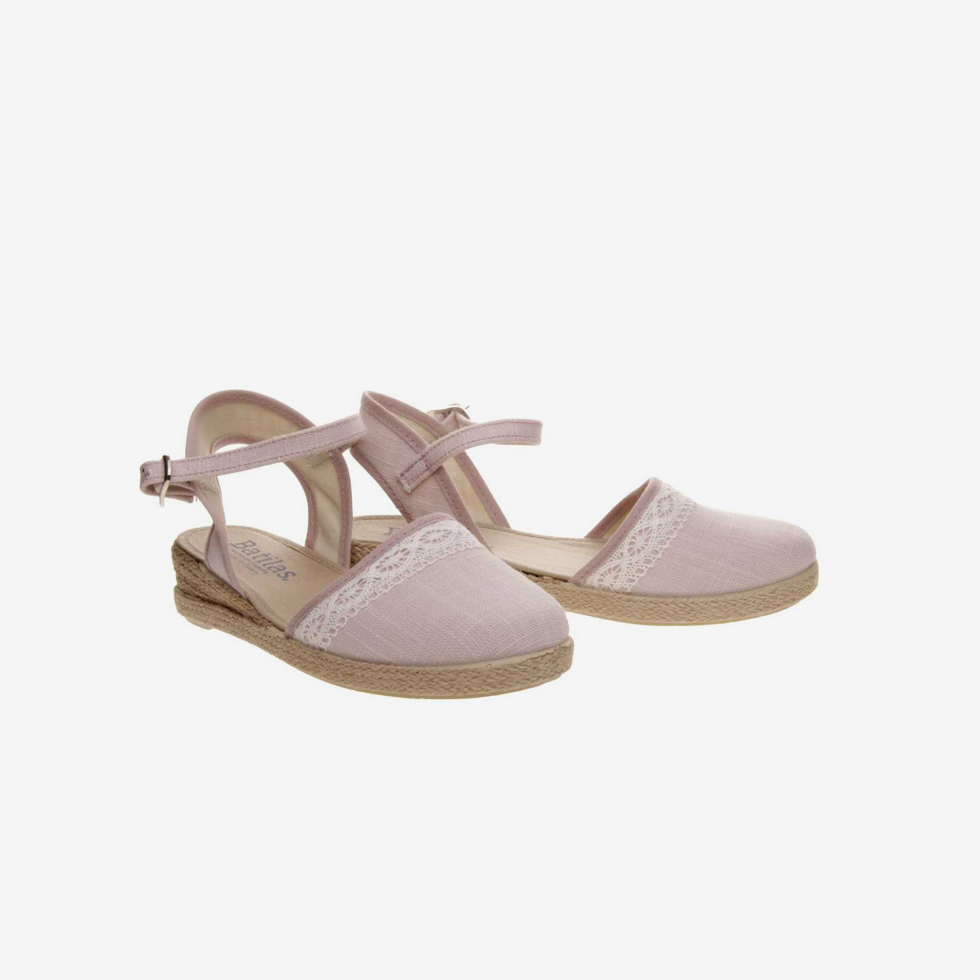 Sandalia de esparto en color rosa con hebilla.