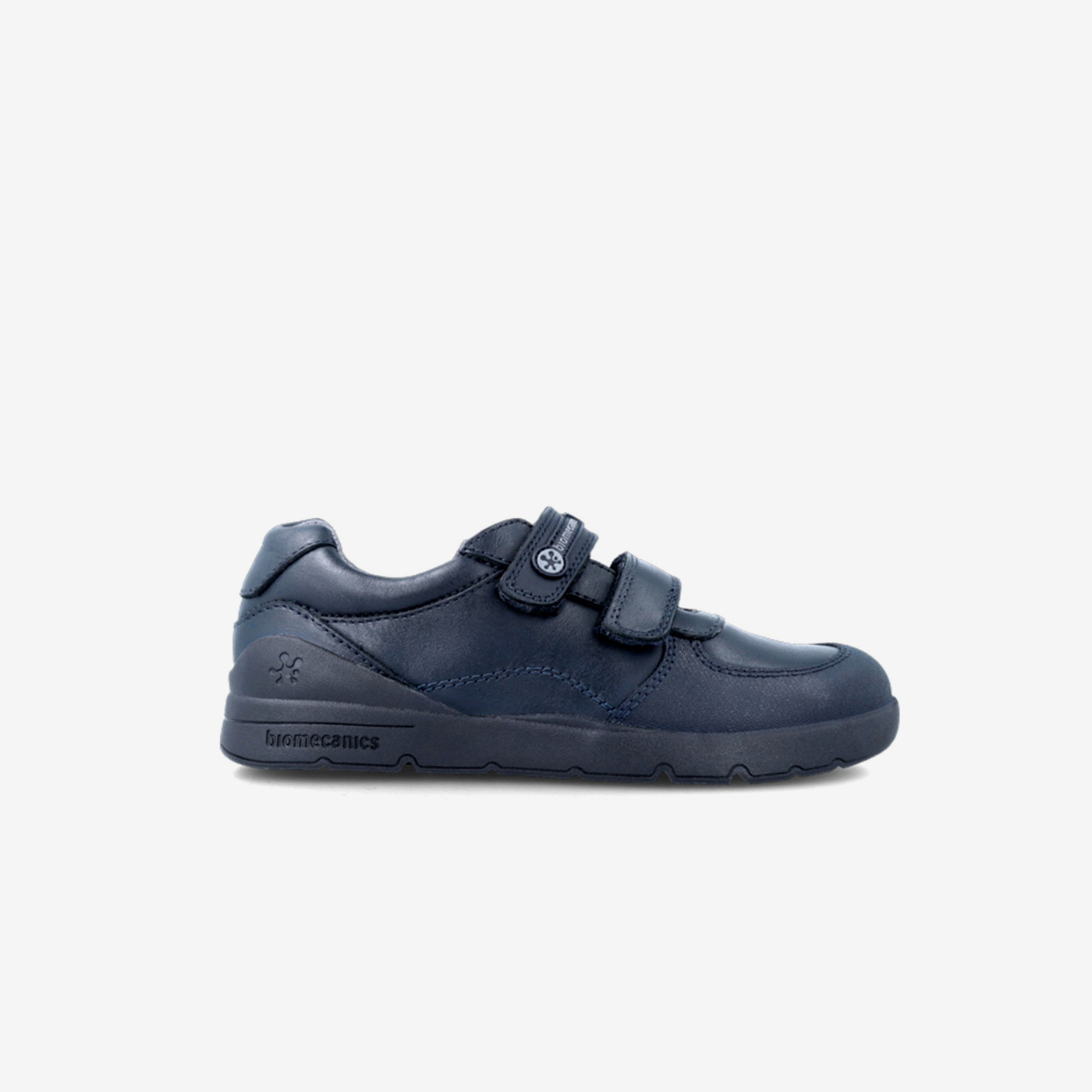 Zapato colegial de niño con doble velcro en azul marino.