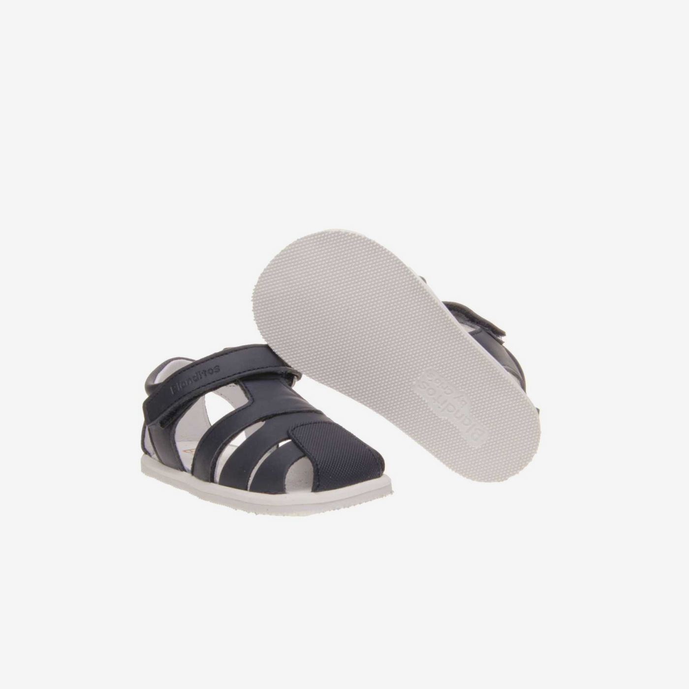 Sandalia de niño respetuosa en azul con velcro.