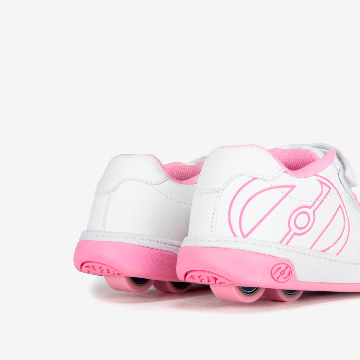 Heelys blancas y rosas con ruedas desmontables y cierre mixto. Comodidad, confianza y diversión para cada paso de tu pequeña.